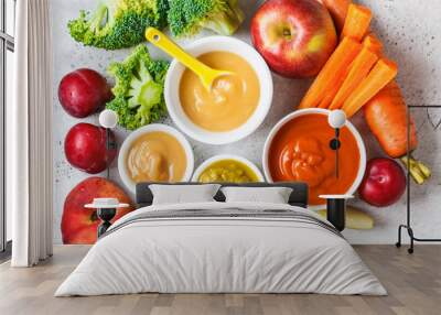 Vegetable and fruit baby puree in white bowls with ingredients. Baby food concept. Wall mural