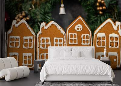 Various christmas gingerbread cookies on dark table with flour Wall mural