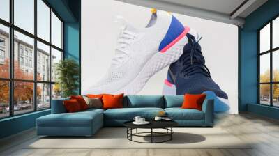 sport shoes for running ,two colors on white background Wall mural