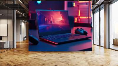 A laptop is on a table with a pair of controllers next to it Wall mural