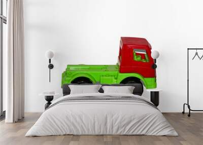 Dirty used toy car truck isolated on white background Wall mural