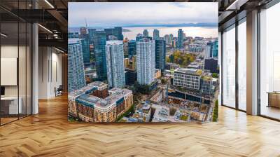 Modern architecture of stunning metropolis from drone footage. Spectacular skyscrapers standing out in the scenery of Seattle, Washington, the USA. Wall mural