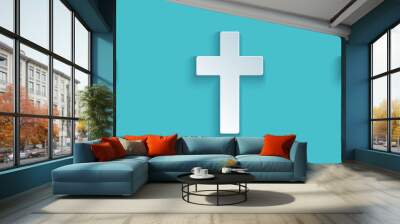 Paper cut Christian cross icon isolated on blue background. Church cross. Paper art style. Vector Illustration Wall mural