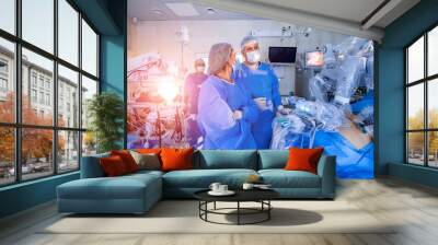 Surgical room in hospital with robotic technology equipment, machine arm surgeon in futuristic operation room. Minimal invasive surgical inoovation, medical robot surgery with 3D view endoscopy Wall mural