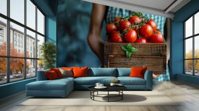 Woman holding crate of tomatoes Wall mural