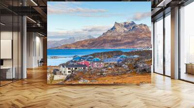 inuit houses and cottages scattered across tundra landscape in residential suburb of nuuk city with  Wall mural