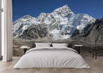 A group of tourists on the trek at the foot of Everest (8848 m) near Gorak Shep lodge - Nepal, Himalayas Wall mural