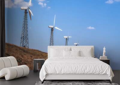 Windmills for power generation on a bright summer day Wall mural