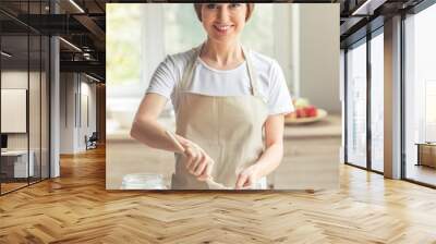 Beautiful woman baking Wall mural