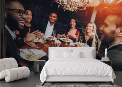 Group of Happy Friends Meeting and Having Dinner Wall mural