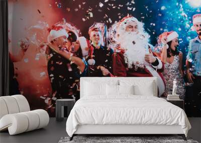 Man in Santa Claus Costume on New Year Party. Wall mural