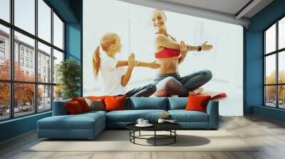 Mum And Daughter Yoga Training. Lotus Position. Wall mural