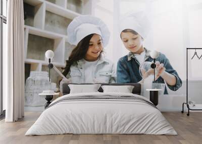 Portrait of Two Cute Children Cooking at Kitchen Wall mural