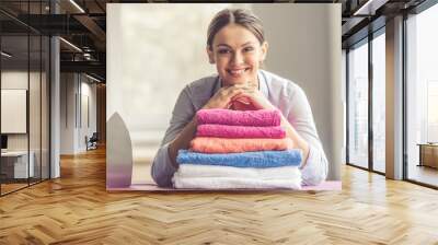 Woman ironing clothes Wall mural