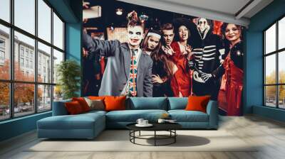 Young People in Halloween Costumes taking Selfie Wall mural