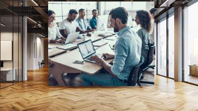 Young Smiling Business People Working on Laptops Wall mural