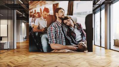 Young Smiling Couple Traveling on Tourist Bus Wall mural