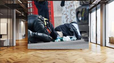 The policeman of London saves the life of an elderly man who was hit by a motorcycle Wall mural