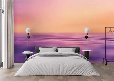 A beautiful ocean scene with a purple and pink sky Wall mural