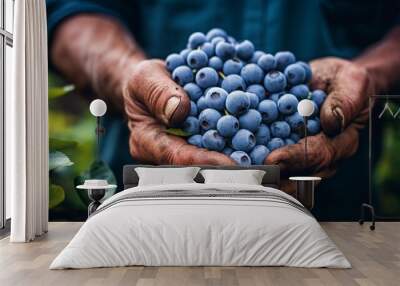 close-up of a man's hands holding a lot of blueberries, harvesting in the garden Generative AI Wall mural