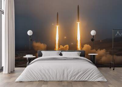 Missile launch site in a desert landscape. Two missiles are ascending into the sky, surrounded by smoke and fire. The launch pad is illuminated by floodlights, and the sky has a dusk hue. Wall mural