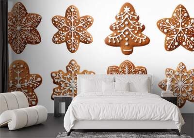 A row of gingerbread cookies with snowflakes and trees on them Set of png elements. Wall mural