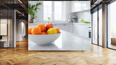 A bowl of citrus adds a pop of vibrant color and freshness in a light-toned modern kitchen. Inspiring fruit bowl in a contemporary setting. Wall mural