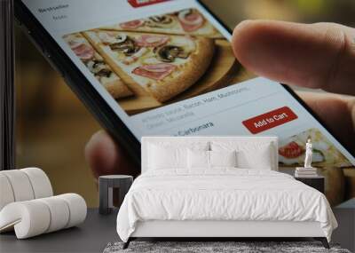 Smartphone fast food online ordering. Choosing pizza on mobile smart phone app. Wall mural