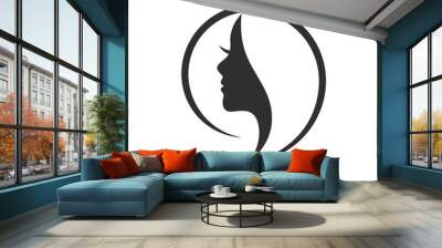 Beautiful female face and beauty of the logo Wall mural