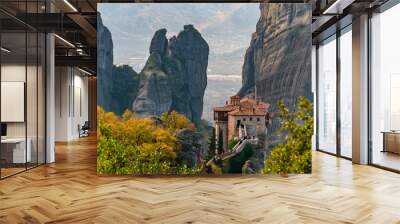 Roussanou monastery, an unesco world heritage site,  located on a unique rock formation  above the village of Kalambaka during fall season. Wall mural