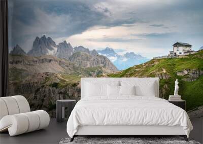 Rescue shelter in Tre Cime Di Lavaredo, Dolomites, Italian alps with mountains in background Wall mural