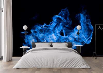 blue fire on black background Wall mural