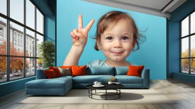 Cute baby children showing peace sign Wall mural