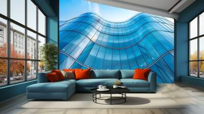 Modern Architectural Marvel: A Wavy Glass Facade Under Clear Skies Wall mural