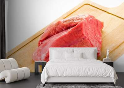 raw beef on wood board isolated on white background Wall mural