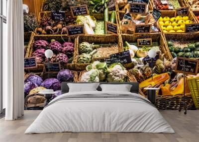 vegetables and fruits at the counter of a covered market Wall mural