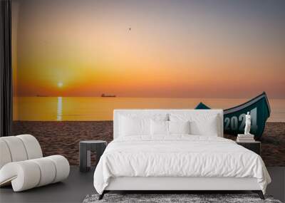 2024 New year concept Fishing Boat on Varna beach shore on sunrise Wall mural