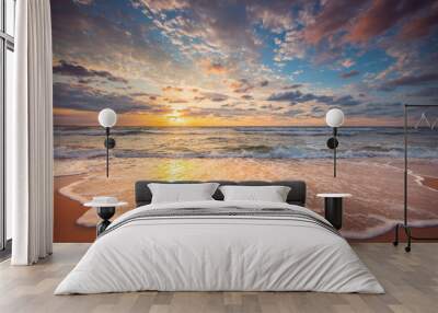 Beautiful cloudscape over the beach and sea at sunrise Wall mural