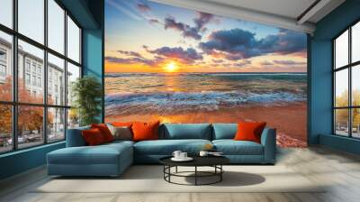 Beautiful sunrise over the sea waves and beach on tropical island beach Wall mural