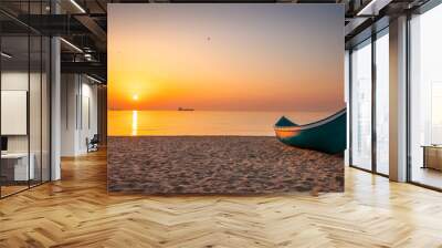 Peaceful sea sunrise over the beach and wooden fishing boat. Beautiful calmness morning for relaxation outdoor in the nature. Wall mural