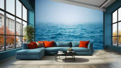 Sea ripple water with morning fog Wall mural