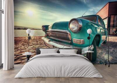 Vintage car near the sea Wall mural