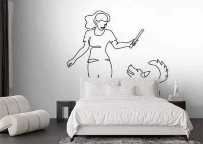 Woman training dog with stick. Continuous one line art Wall mural