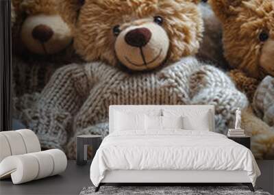 A group of teddy bears sitting on top of a bed Wall mural