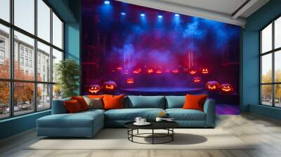 A stage set up for a halloween party with pumpkins on the stage Wall mural