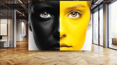 A woman with black and yellow face paint on her face Wall mural