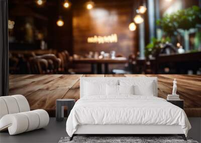 Wooden table is in restaurant with empty glasses on top of it. Wall mural