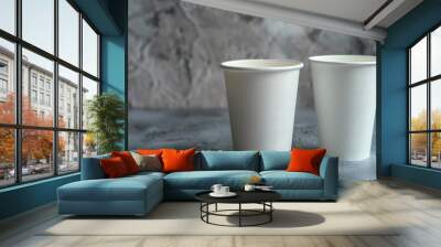 two white disposable cups on gray surface Wall mural