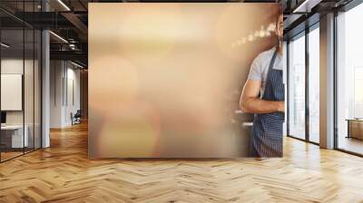 Small business, cafe owner and portrait of man with mockup and confident smile in restaurant startup advertising. Success, happy manager or coffee shop barista with bokeh, apron and service mindset. Wall mural