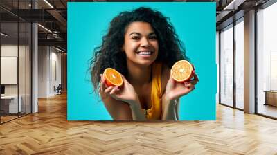 African american woman isolated on blue background. Wall mural